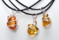 Preview: BALTIC amber pendant on leather strap "spiral"