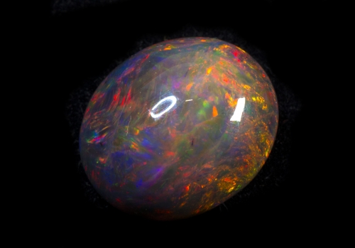 Welo Multi-Fire Black Opal Äthiopien, oval 6,9 Carat