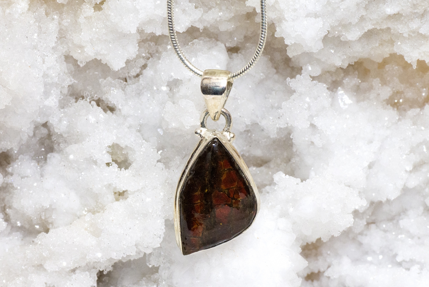 Ammolite pendant, fire red set in silver!